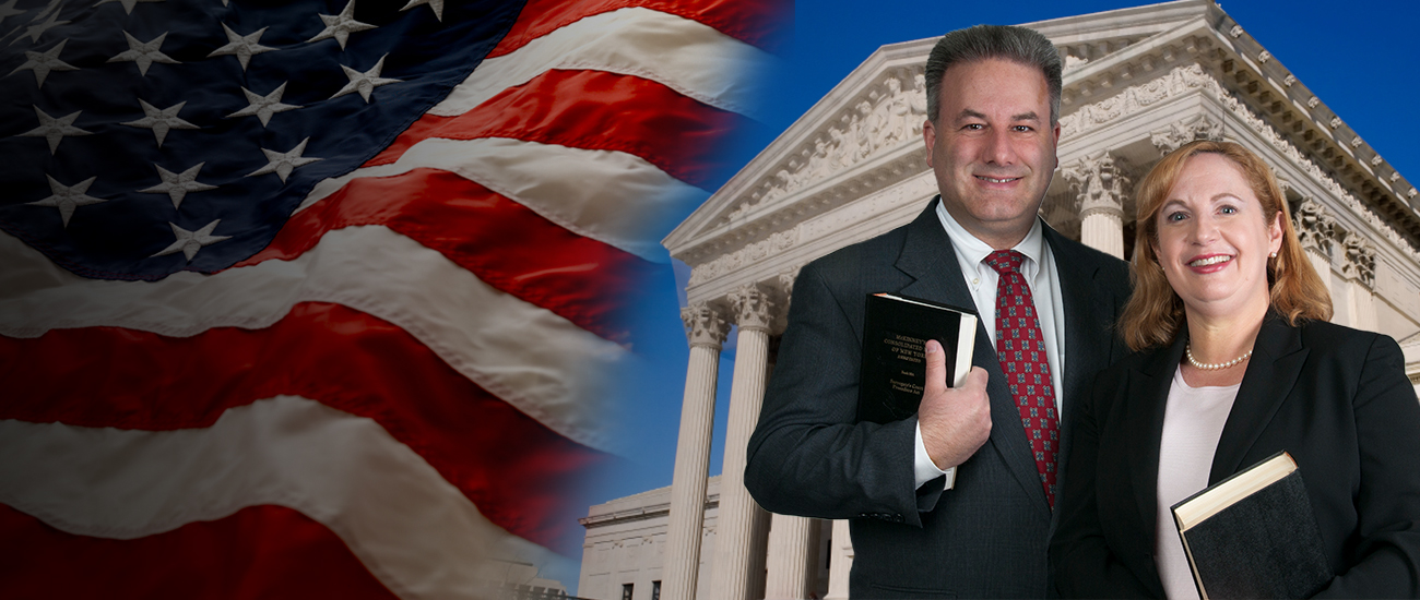 Attorneys with the US flag and courthouse at the background